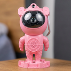 Proyector Astronauta 360° rosado con Bluetooth, Luz Nebulosa y Ruido Blanco